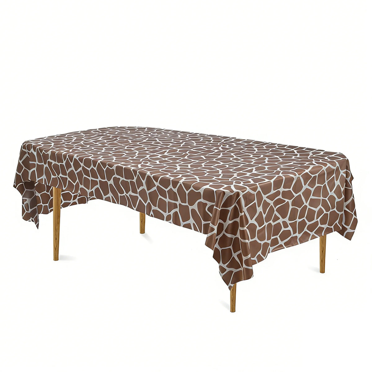 Brown cow print disposable plastic tablecloth spread over a rectangular table.