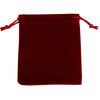 A deep red velvet drawstring gift bag with tasseled ties.