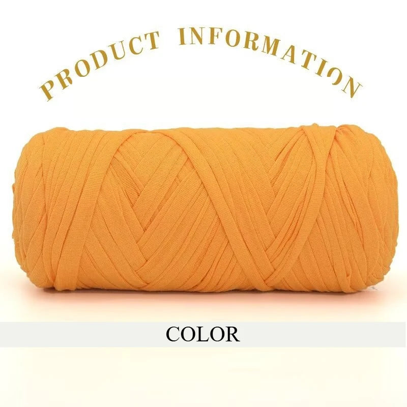 A tightly wound skein of thick orange polyester blended yarn for crafting.
