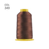 A spool of dark brown embroidery thread with a yellow core.