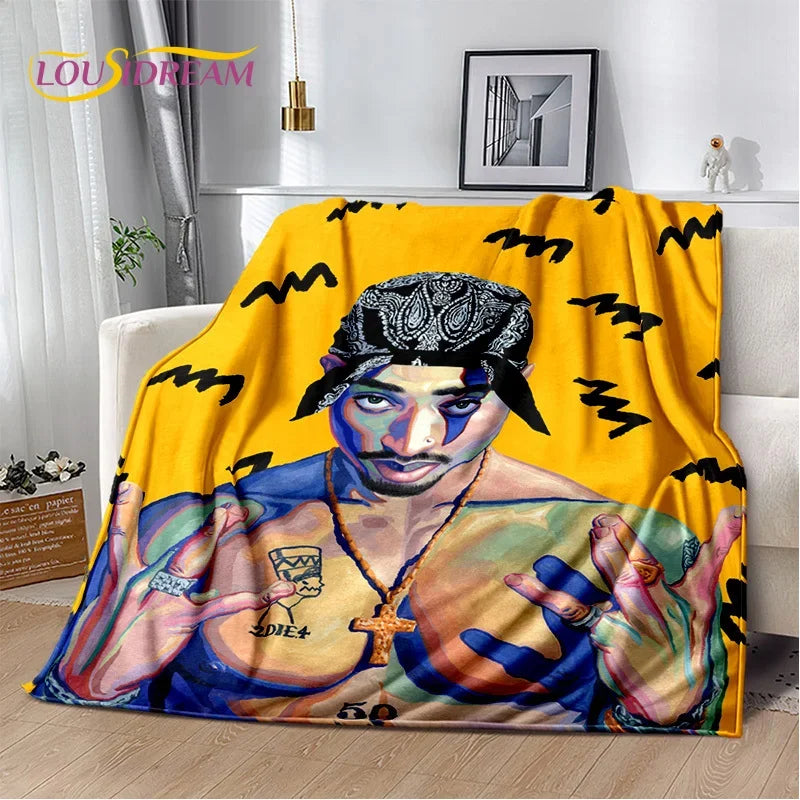 A vintage-inspired graphic throw blanket featuring a portrait of a man with dark skin and intricate facial markings against a