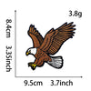A brown eagle embroidery patch shown with dimensions of 9.5cm by 3.7inch.