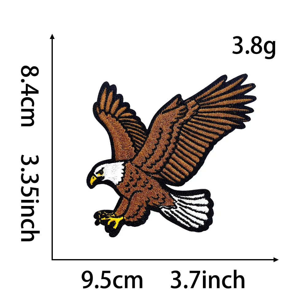A brown eagle embroidery patch shown with dimensions of 9.5cm by 3.7inch.