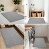 A collection of gray waffle design non-slip bathroom mats shown in various contexts.