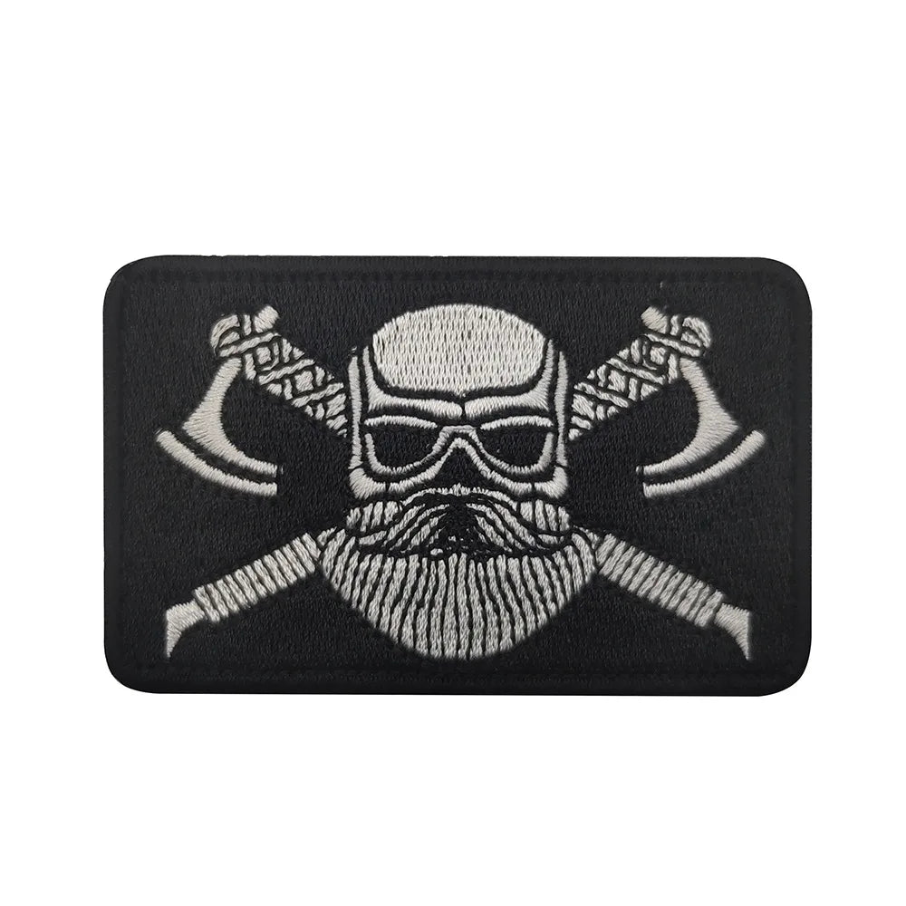 Black embroidered Valknut Viking patch featuring a bearded face with hook and loop backing