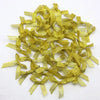 A pile of small, gold satin ribbon bows for crafts and decor.