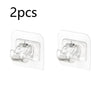 Two clear self-adhesive curtain rod clips for window and wall installation.