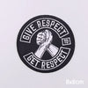 Black embroidery patch with white text that reads Give Respect to Get Respect