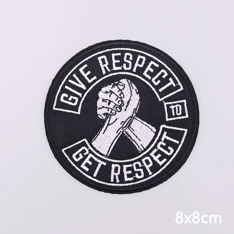 Black embroidery patch with white text that reads Give Respect to Get Respect