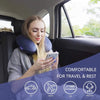 A woman rests her head on a blue bamboo fiber U-shaped travel neck pillow inside a car, airplane, train, or office chair.