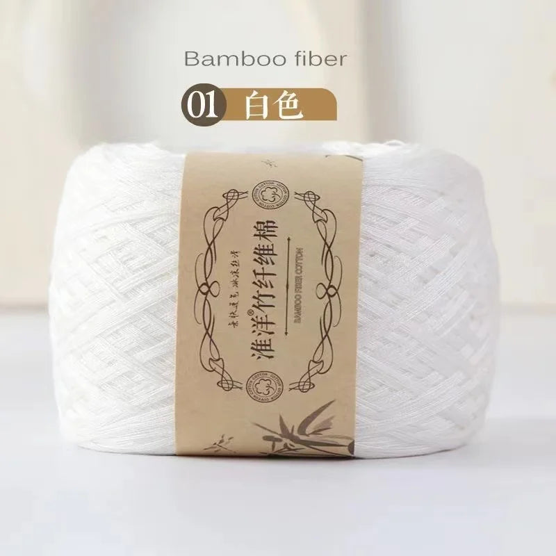 A ball of white bamboo fiber yarn labeled as color 01 for crafting.