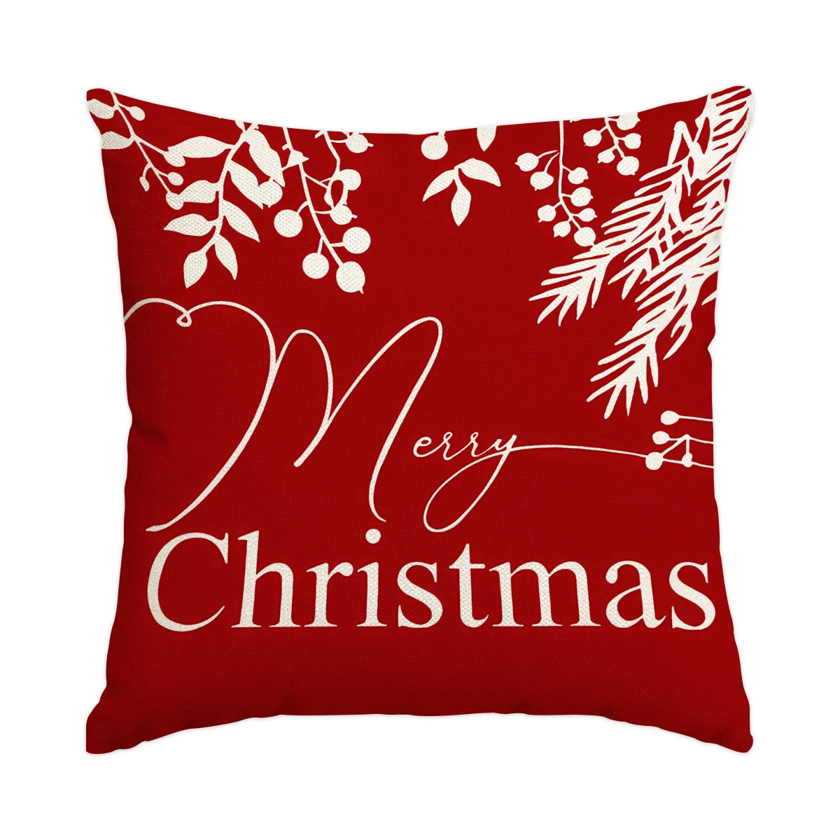 A red pillow featuring white holiday foliage and the text Merry Christmas