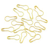 A collection of gold-colored gourd-shaped locking safety pins for knitting and sewing.