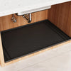 A black silicone liner is installed in an under sink cabinet to protect the surface.