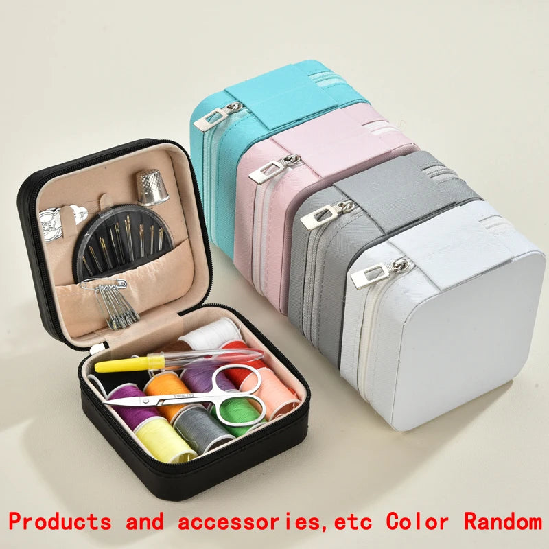 A collection of colorful leather sewing boxes and a hand sewing kit displayed on a light background.