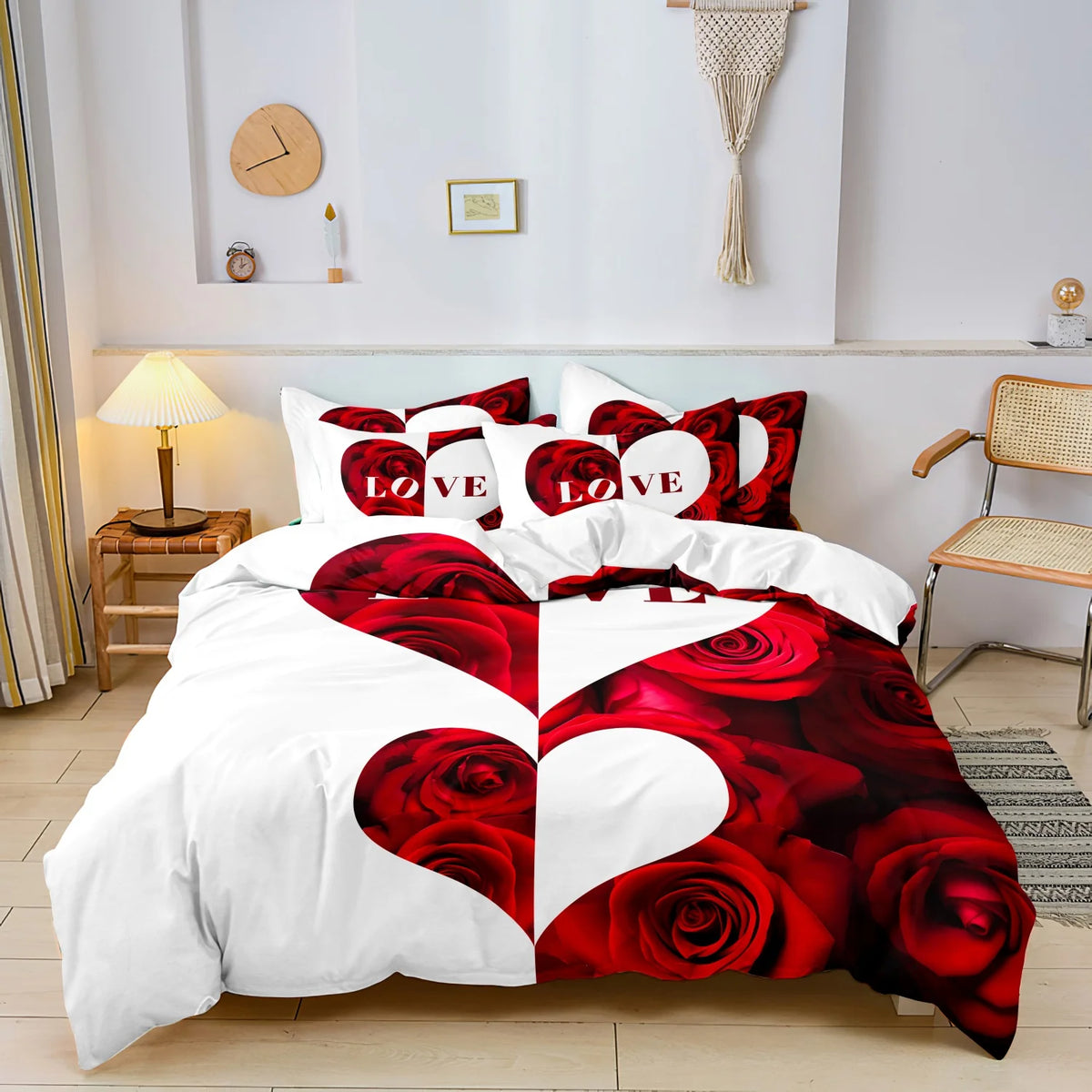A white duvet cover featuring a large red rose pattern and heart designs on a white background.