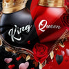 A red and black glass perfume bottle with a gold crown and rose pattern on the label.