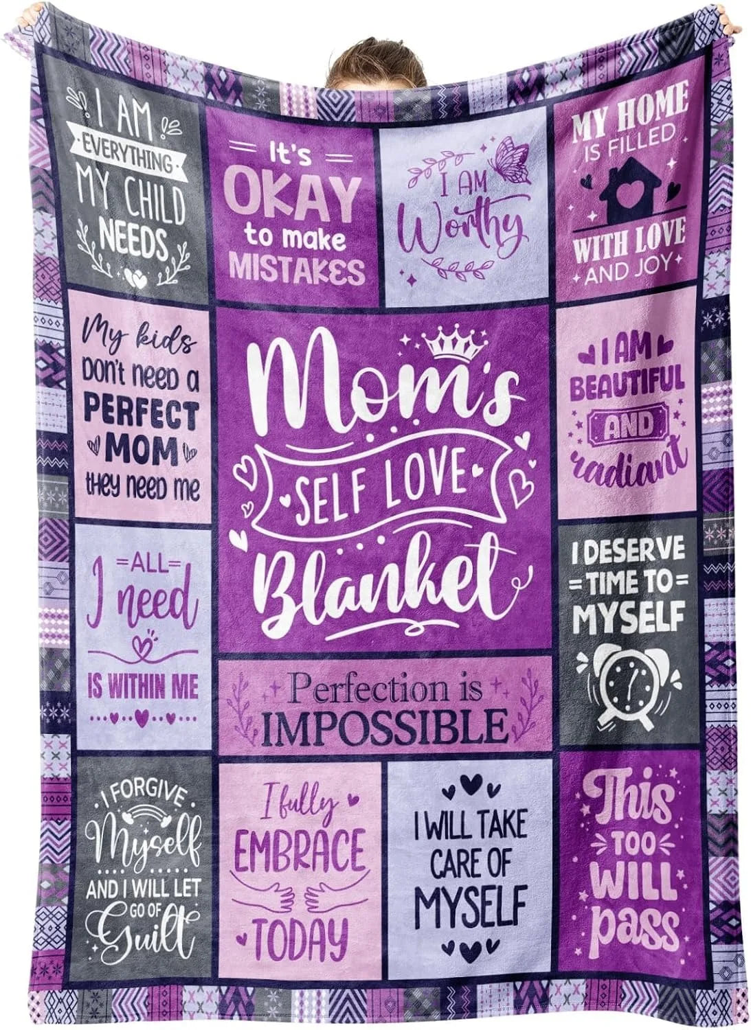 A purple and gray printed throw blanket featuring inspirational quotes about self-love and acceptance.