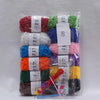 A bundle of 12 colors of milk cotton yarn for a crochet kit, packaged in clear plastic.