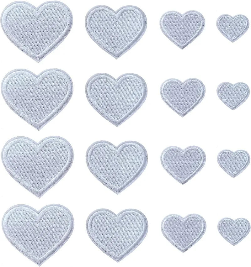 A collection of 24 iron-on love heart embroidered patches in light blue thread.