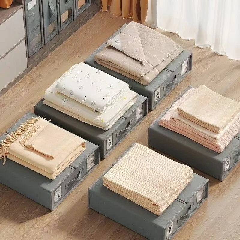 Gray storage boxes filled with neatly folded beige non-woven fabric for bedding and clothing