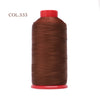 A spool of dark brown heavy duty nylon sewing thread with a red cap.