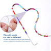 A heart-shaped string of colorful beads is shown with a small needle for threading, suitable for DIY jewelry making.