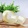 Roll of cream satin ribbon for gift wrapping and DIY crafts