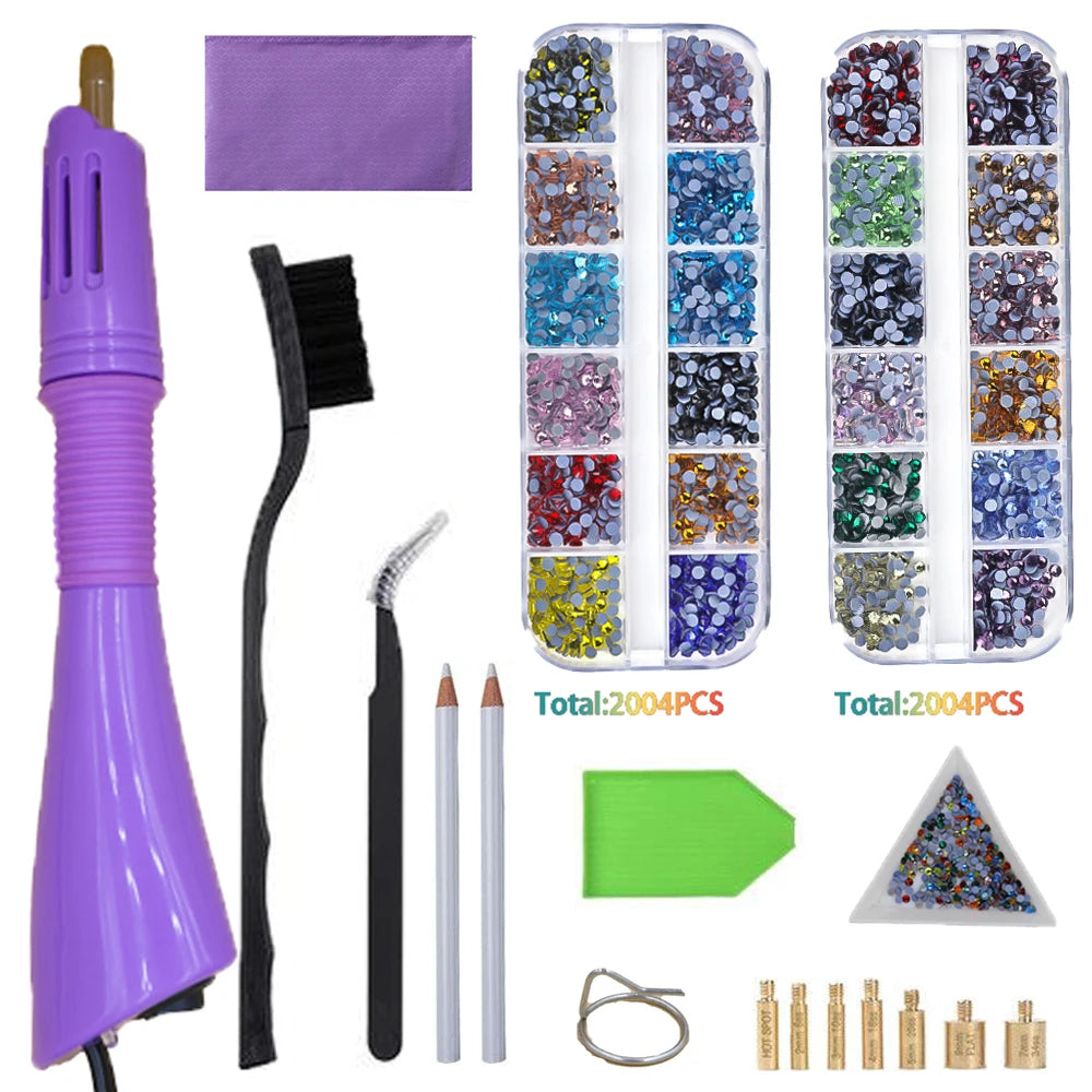 A set of 2004 crystal hot fix rhinestones, an applicator tool, and various tools for applying crystals.