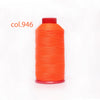 A spool of bright orange heavy duty nylon sewing thread labeled col.946.