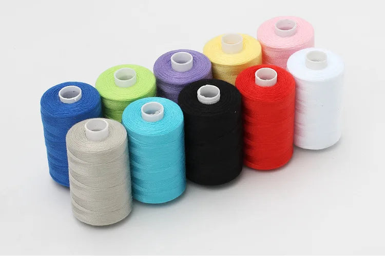 A collection of ten colored polyester sewing thread spools in various shades including blue, green, purple, yellow, pink, red