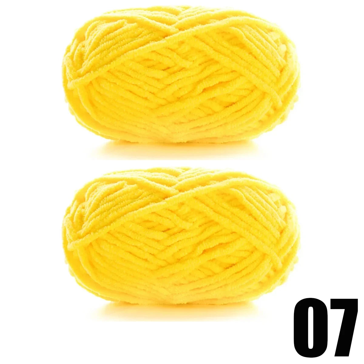 A ball of bright yellow thick velvet yarn for knitting and crochet