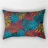 A decorative pillowcase featuring a vibrant tropical leaf print in shades of teal, orange, and yellow.