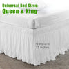 Ruffled white bed skirt designed for Queen and King sized beds