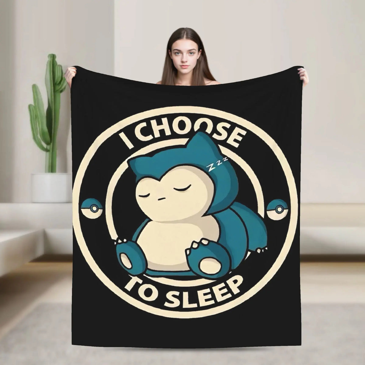 A black throw blanket featuring a graphic of a sleeping blue otter with the text I choose to sleep.