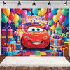 A vibrant birthday party backdrop featuring a cartoon race car character surrounded by colorful balloons and gift boxes.