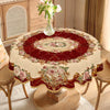Elegant floral tablecloth with a vintage rose print featuring deep red and cream tones.