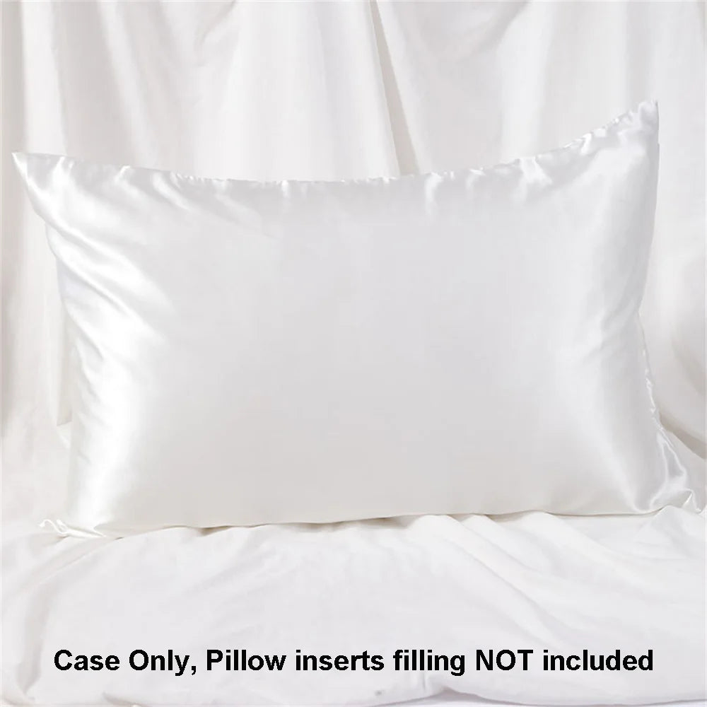 White satin pillowcase with a rectangular insert shown on a white sheet.