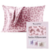 Pink leopard print satin pillowcase with a tie shown next to its packaging box