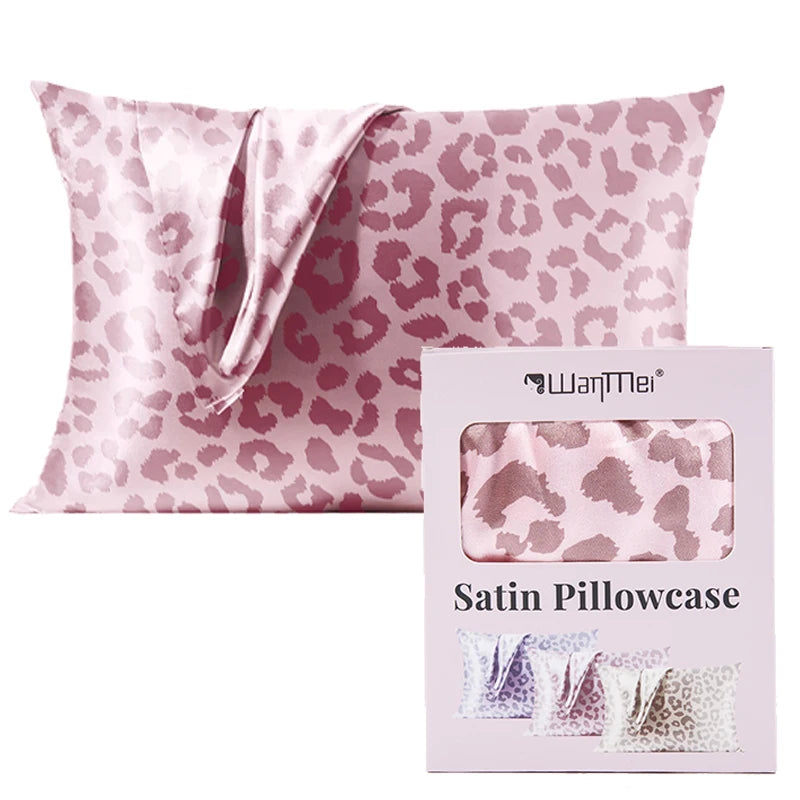Pink leopard print satin pillowcase with a tie shown next to its packaging box
