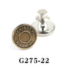 A round, brass-colored button pin with the text PERFECT FIT BUTTON engraved on it and a silver post.