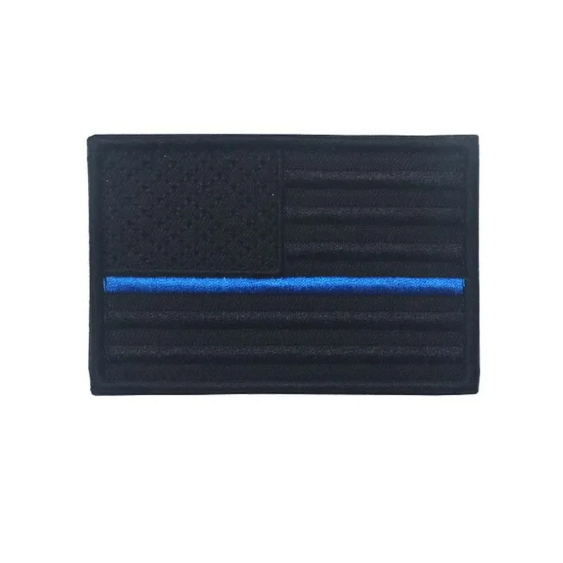 Black flag patch with blue horizontal stripe and hook and loop backing