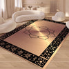 A modern geometric soft area rug with a lotus design and intricate black patterns on a light wood floor.