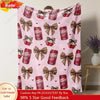 Pink flannel throw blanket featuring a leopard print pattern and decorative bows.