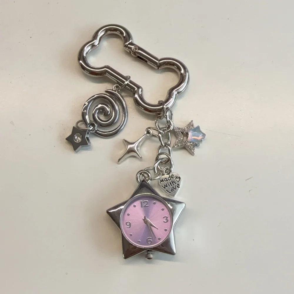 Silver star pocket watch keychain with an adjustable clock face and decorative charms