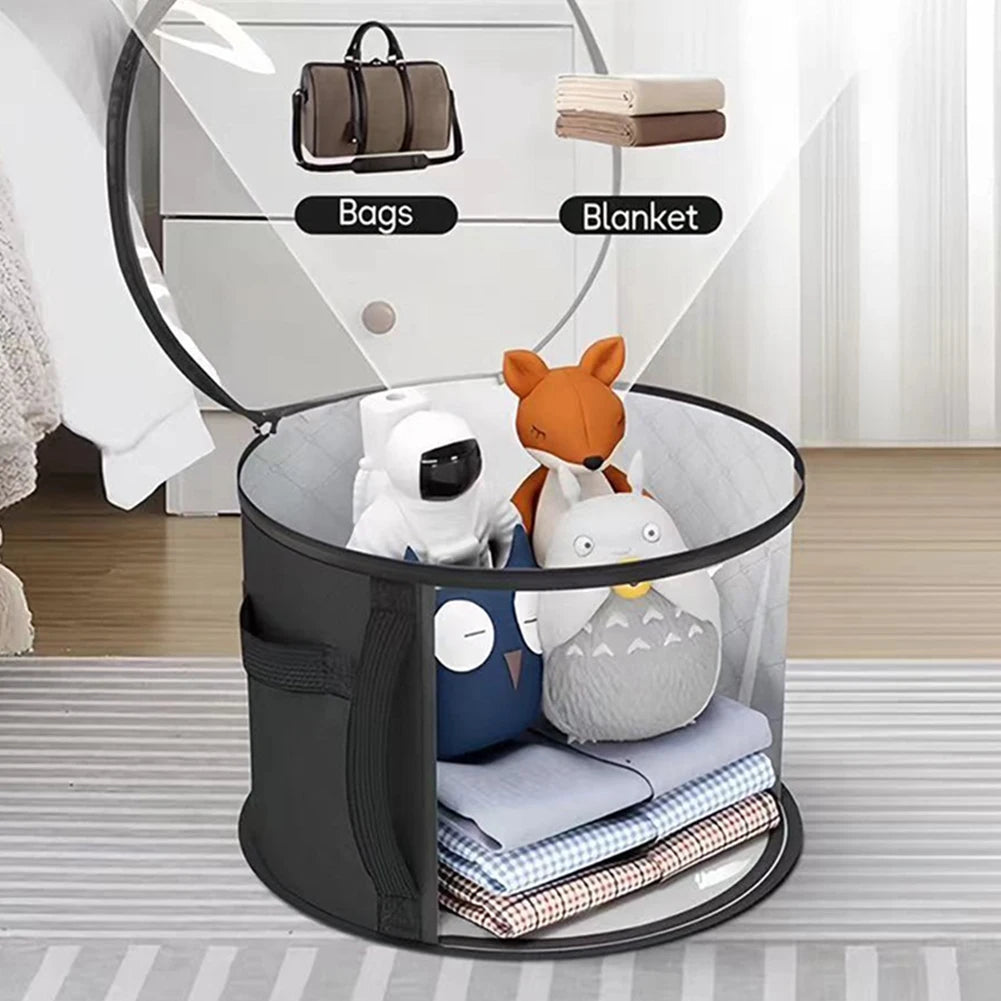 A round fabric storage hat organizer with a mirror and compartments for bags and a blanket.
