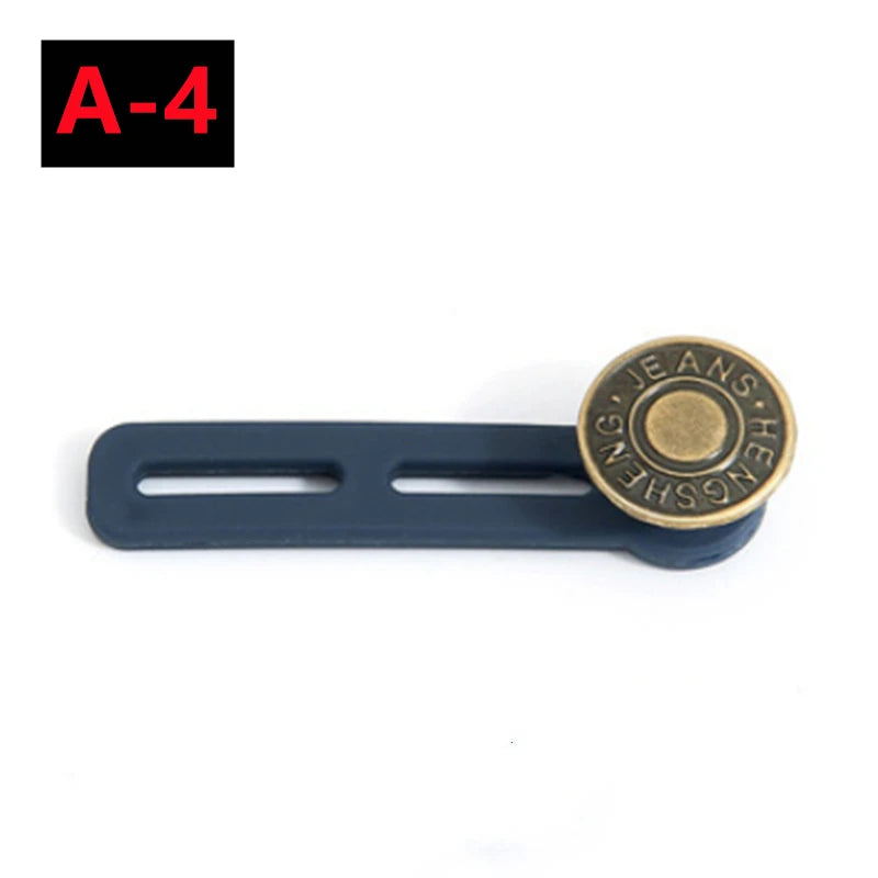 A metal button extender for pants and jeans with a gold-colored button.