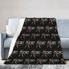 A black wool throw blanket featuring a repeating pattern of the text C7