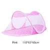 Pink foldable mosquito net designed for infant cribs
