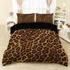 A leopard print duvet cover set featuring a brown and black animal print on a bed.